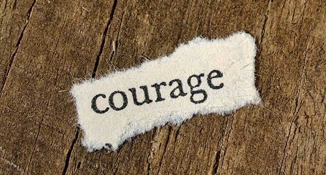 Text mit der Schrift Courage